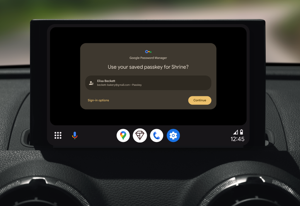 Credential Manager passkey prompt displayed on an in-vehicle screen in Android Automotive OS.