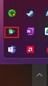 Captura de pantalla de la barra de tareas de Windows 11 Al seleccionar la imagen de zanahoria, se muestran los íconos ocultos y un cuadrado rojo rodea el 